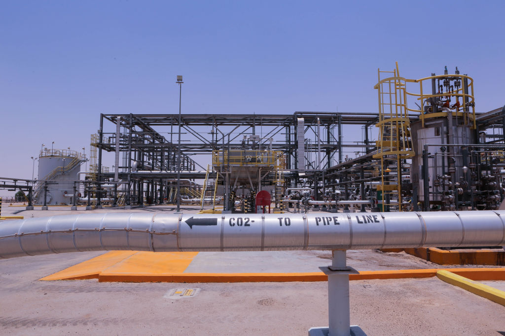 A pipeline marked with 'CO2' at an outdoor industrial facility.