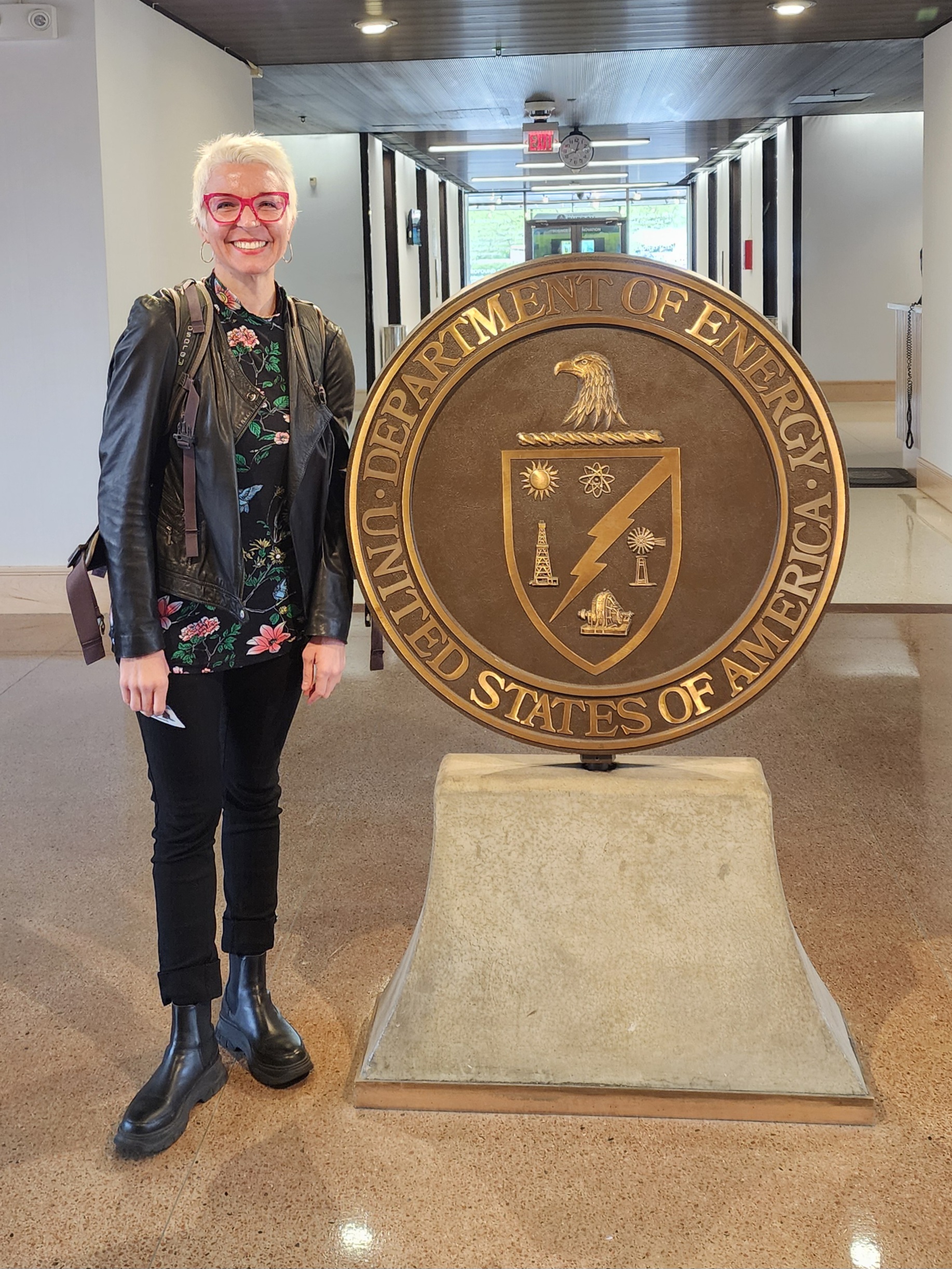 Reporter Cat Clifford seen here in the entryway to the Department of Energy headquarters in Washington DC. 