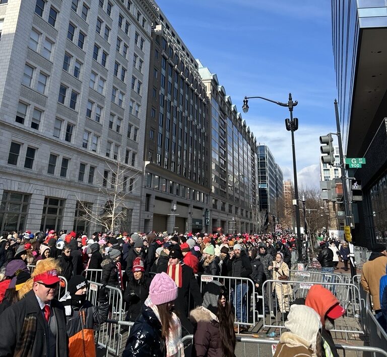 Crowds are crammed several blocks away from Capital One Arena in downtown DC. Photo by Amena H. Saiyid