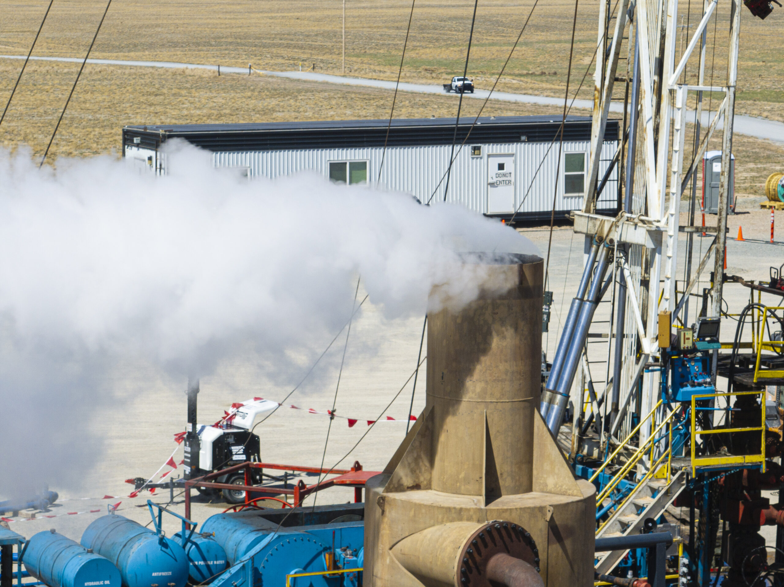 Steam coming out of a geothermal demonstration project at FORGE in Utah. In a geothermal power plant, this steam would go into a turbine and then a generator to produce electricity. Photo credit: Eric Larson, Flash Point SLC.