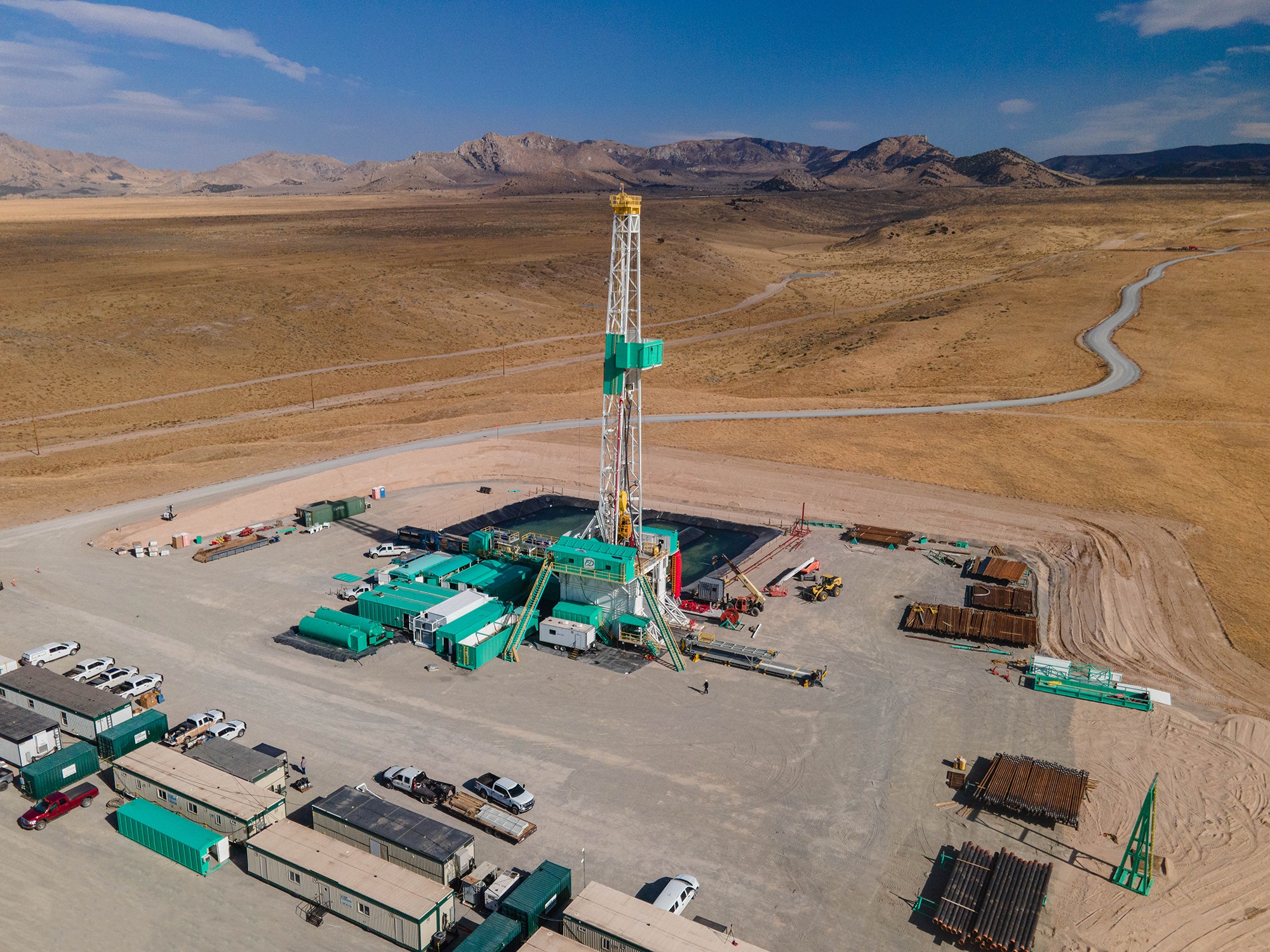 One of Utah FORGE's two deep, deviated (65 degrees to the verticle) geothermal wells being drilled. Photo credit: Eric Larson, Flash Point SLC.