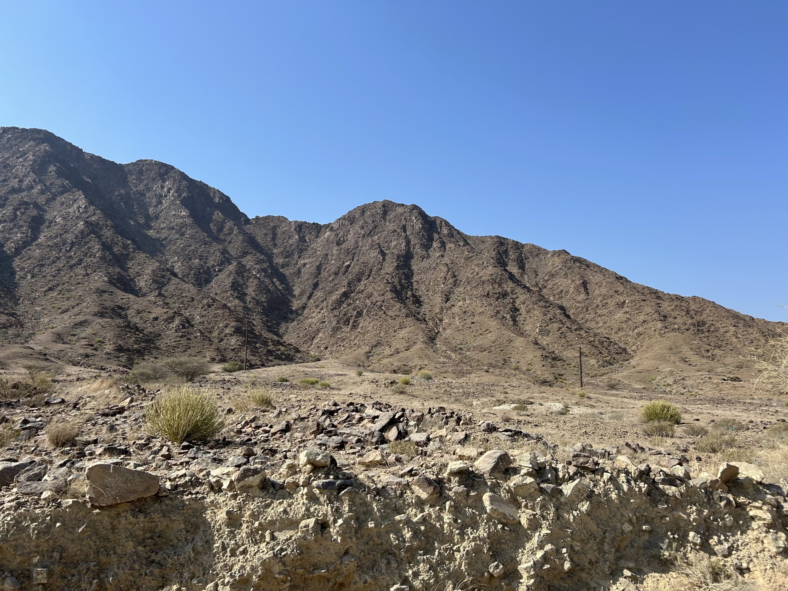 The jagged outcrops of the Hajar Mountains that border UAE and Oman. Photo by Amena H. Saiyid, May 5, 2025
